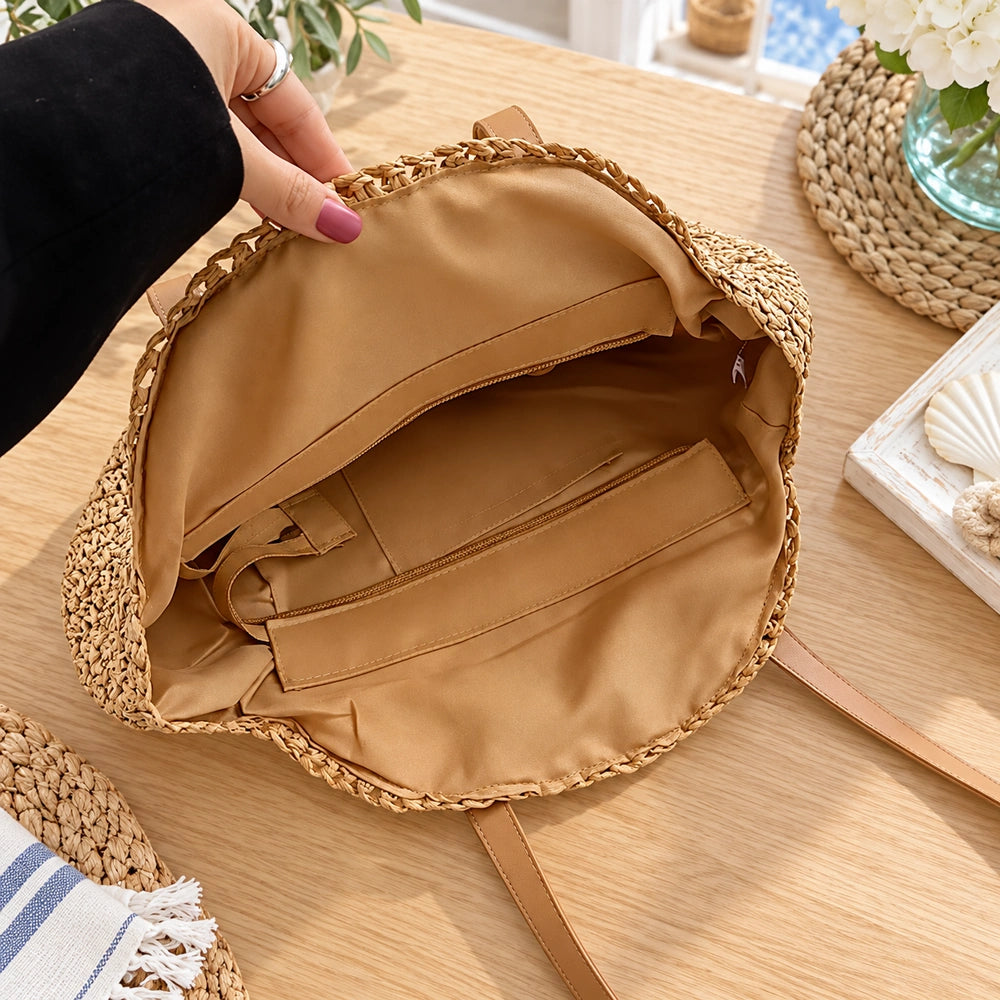 Intérieur doublé du grand sac rond avec poche zippée
