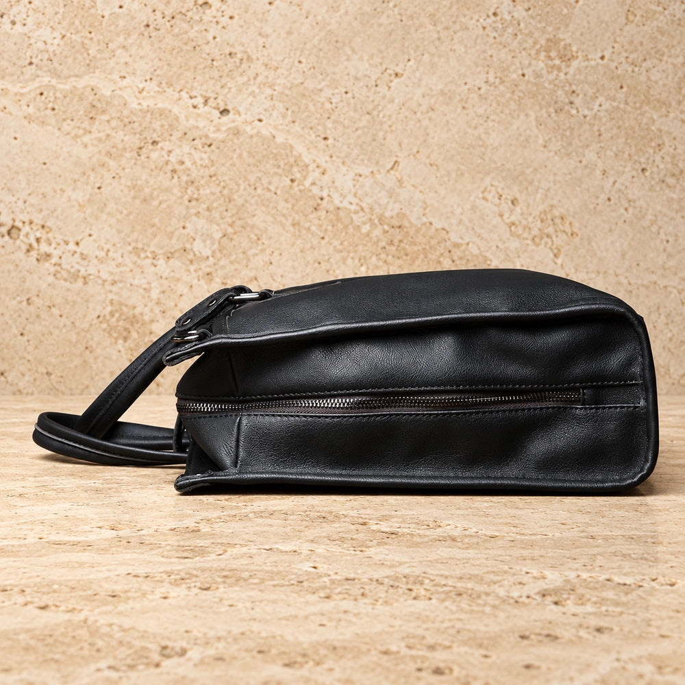 sac à main noir homme coté posé