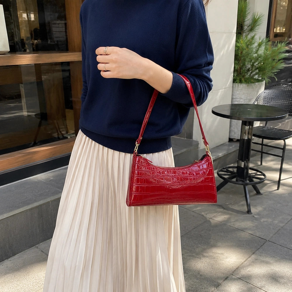 Sac à main rouge bandoulière bras