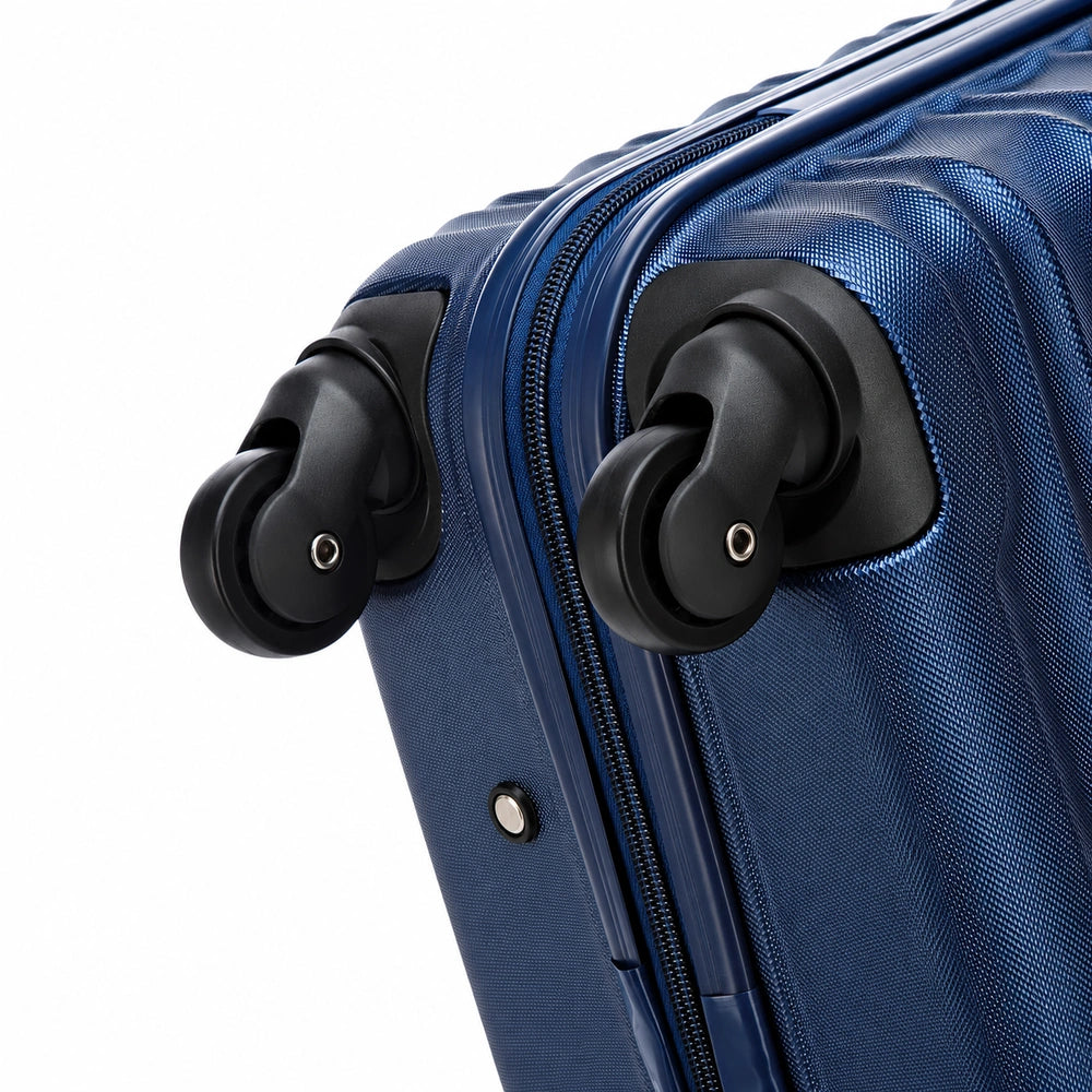 Grande valise rigide roue